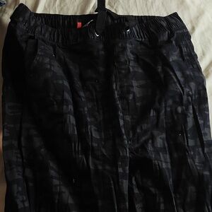 Size Large pants, black army pattern slim fit